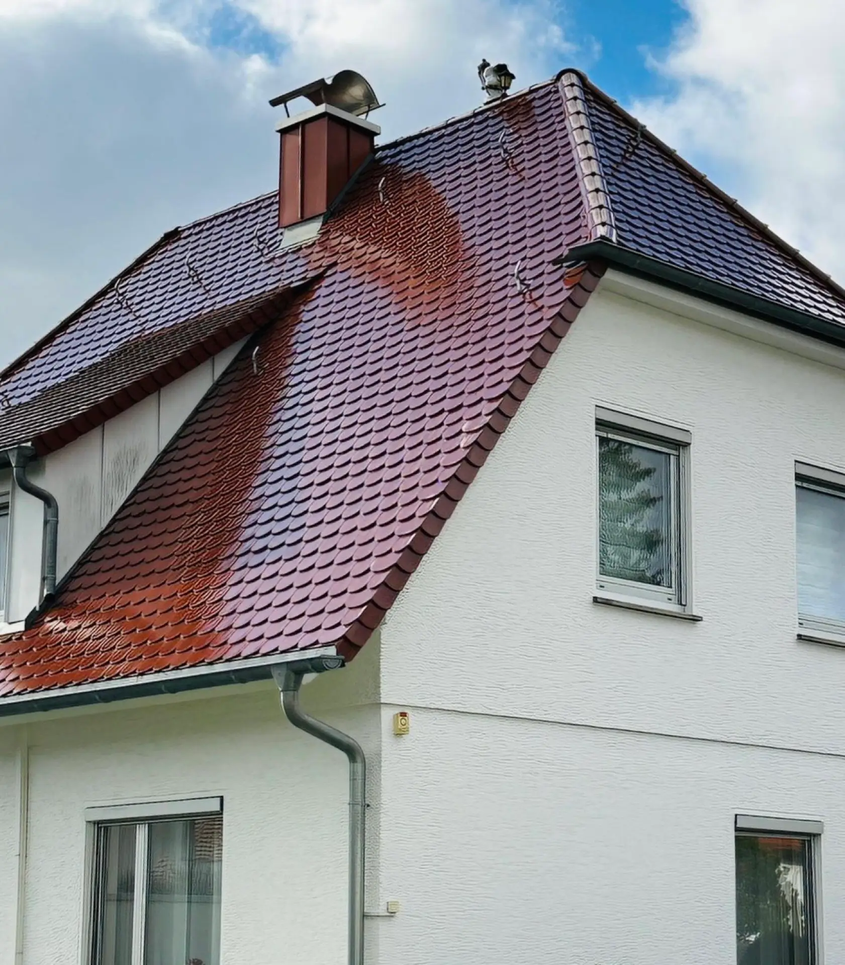 Einfamilienhaus mit rotem Biberschwanz-Ziegeldach